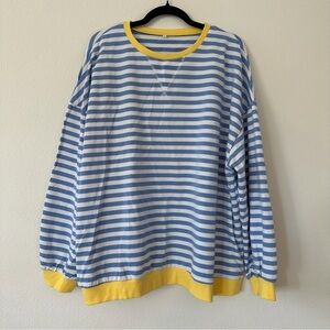 Blue and White Striped Sweatshirt with Yellow Accents